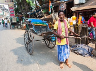 Rickshaw tirados por personas