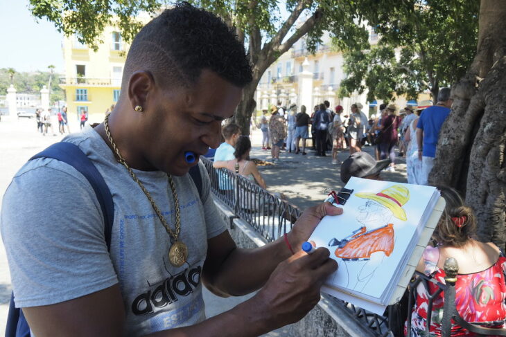Pintor callejero en la Habana
